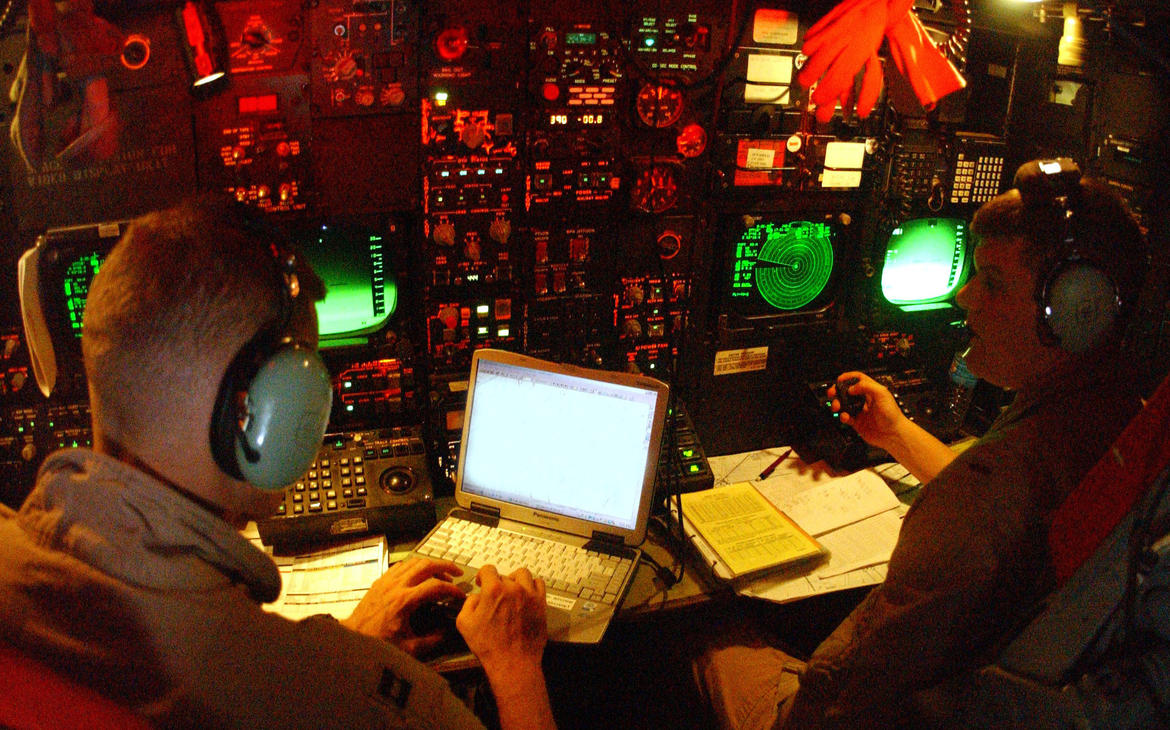 B-52 Stratofortress navigators track mission progress during an Operation Iraqi Freedom bombing mission.